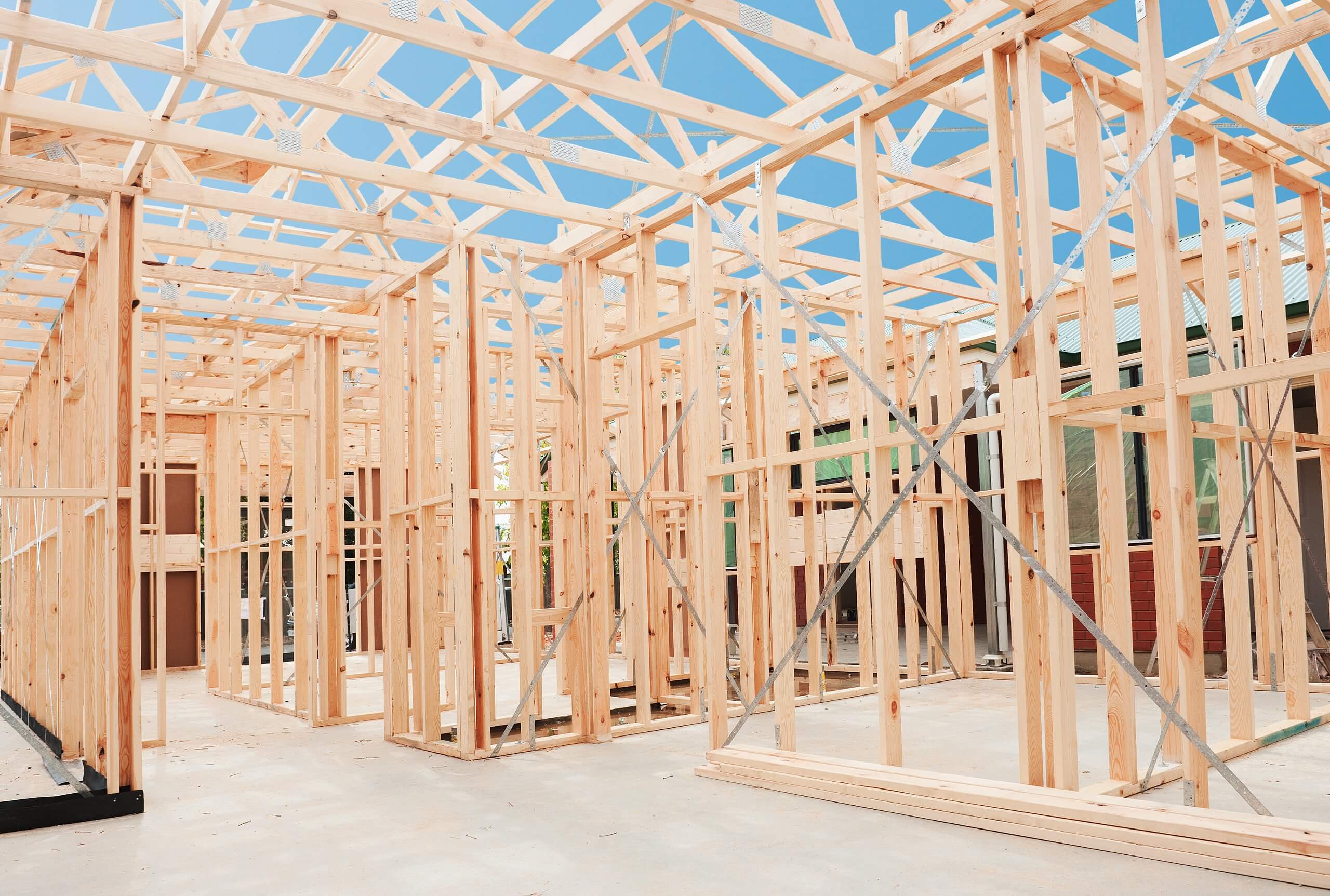 House frame under construction, highlighting Smartway Builders' expertise in delivering custom new builds with quality craftsmanship on the Kapiti Coast.